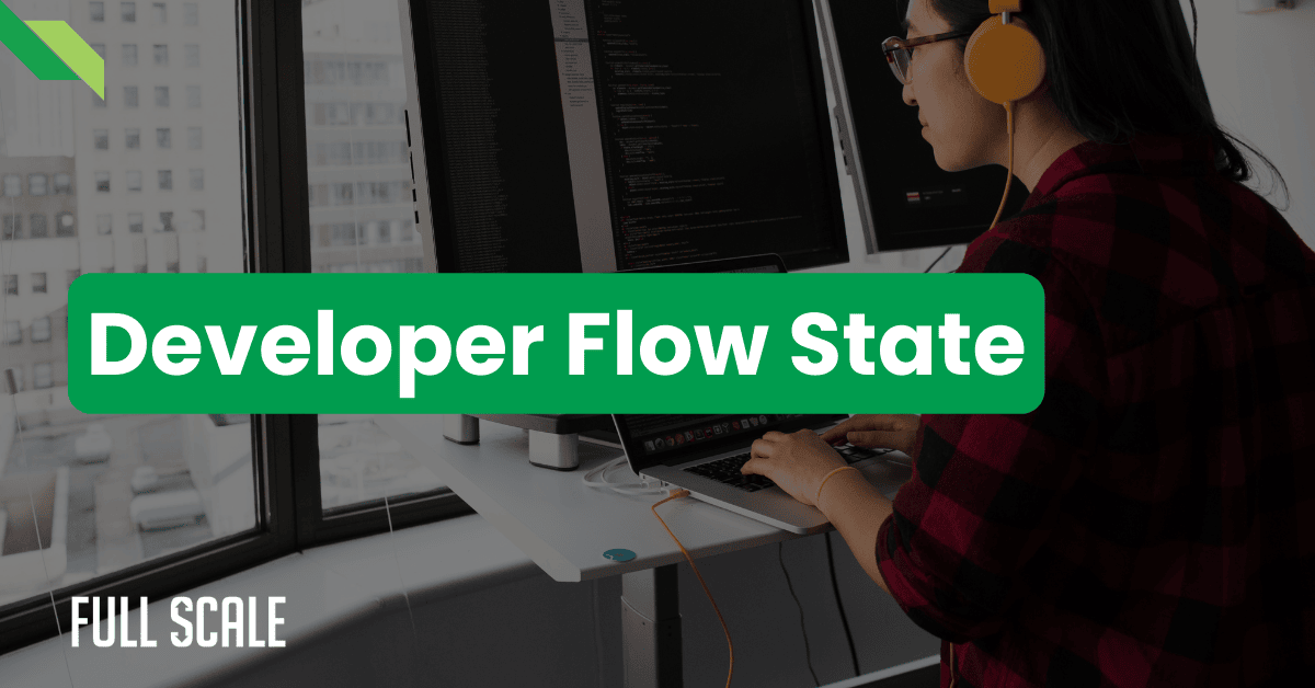 Person with headphones working at a standing desk with multiple monitors displaying code, immersed in a deep work environment; text overlay reads "Developer Flow State".