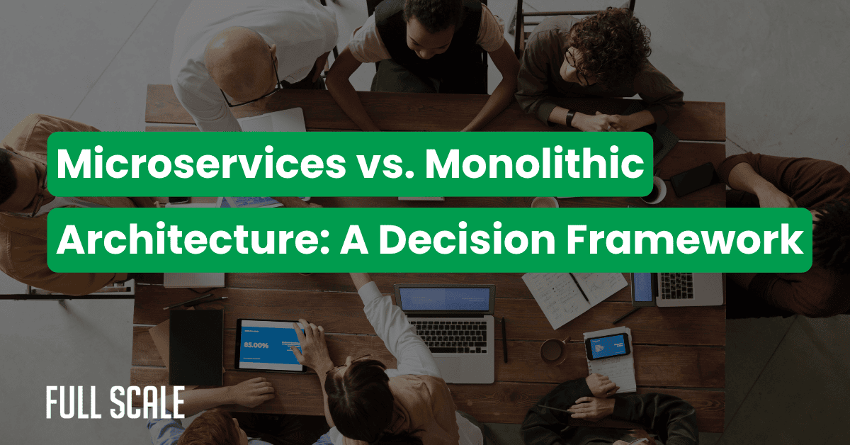 A group of people sit around a table with laptops and papers; text overlay reads "Microservices vs. Monolithic Architecture: When to Use Microservices vs Monolithic – A Decision Framework.