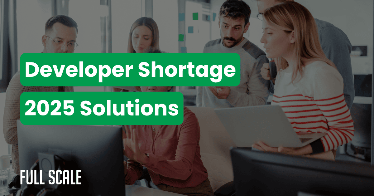 A group of people work together at computers in an office. Overlaid text reads: "Developer Shortage 2025 Solutions"—highlighting ways to overcome developer shortage. The Full Scale logo is in the corner.