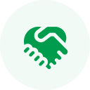 Green circle icon featuring a white handshake symbol in the center, ideal for representing collaborations like outsourcing React development.