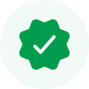 A white checkmark inside a circular green badge symbolizes the success you'll achieve when you hire a dedicated JavaScript developer.