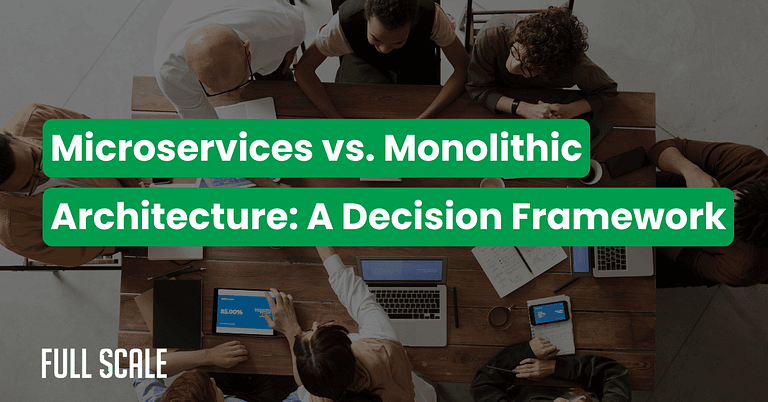 A group of people sit around a table with laptops and papers; text overlay reads "Microservices vs. Monolithic Architecture: When to Use Microservices vs Monolithic – A Decision Framework.
