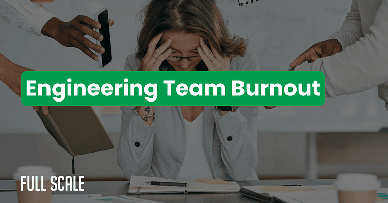 A stressed woman sits at a desk with her head in her hands while several people hand her devices and documents. Text overlay reads "Prevent developer burnout and support engineering team retention.