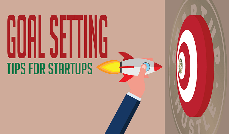 A graphic featuring a hand holding a rocket aimed at a bullseye target, with the text "goal setting tips for startups" suggesting guidance on achieving objectives for startups.