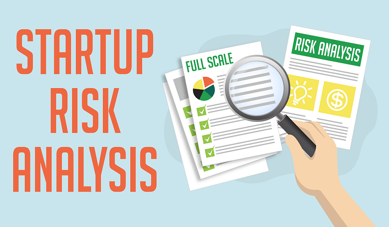 A hand holding a magnifying glass with the words startups risk analysis.