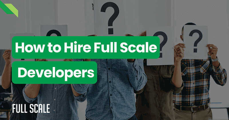 Four people holding signs with question marks, standing behind a banner that reads "hire full scale developers.