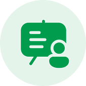 Green circle featuring a white speech bubble icon and a person icon, symbolizing the seamless communication offered by an Android application development company.