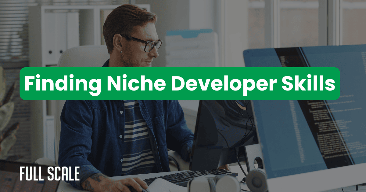 A man at a desk works on a computer with large monitors. The text “Finding Niche Developer Skills” is displayed prominently, highlighting the value of tapping into the global talent pool for specialized roles.