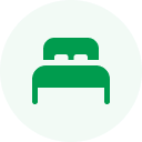 A green circle with a simplified icon of two overlapping person silhouettes.