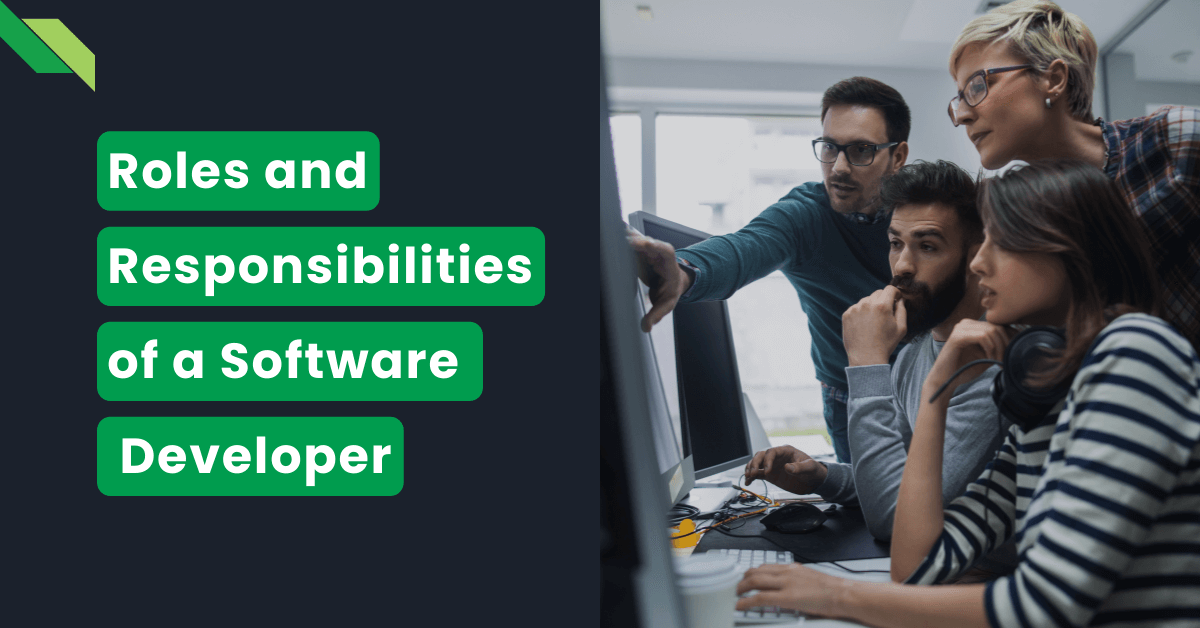 Team of software developers discussing roles and responsibilities at a computer.
