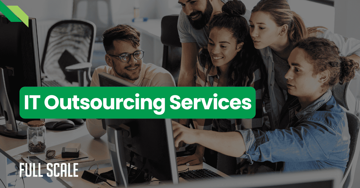 Five people are collaborating at a computer in an office, showcasing the teamwork behind IT outsourcing services. The text overlay reads "IT Outsourcing Services Company," highlighting the seamless integration of expertise and technology.