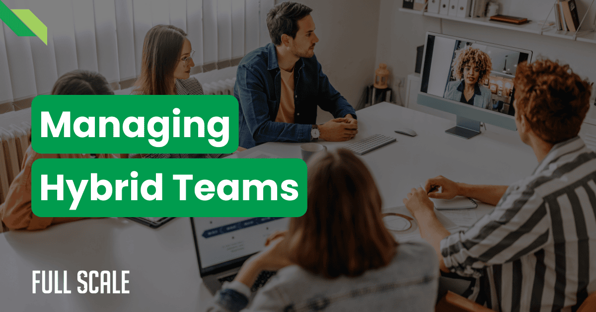 In a meeting room, people engage in a video conference, exemplifying remote and local team collaboration. Text on the image reads, "Managing Hybrid Teams" and "Full Scale.