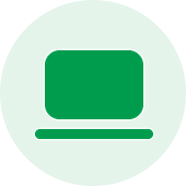 A green circle with an icon of a computer monitor and keyboard in the center, representing our MVP app development services.