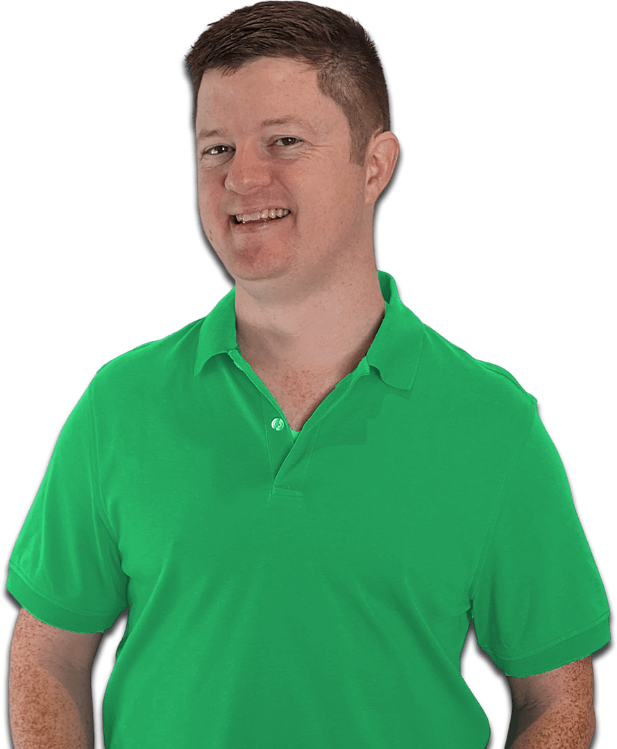 A man in a green polo shirt smiling against a multi-colored striped background.